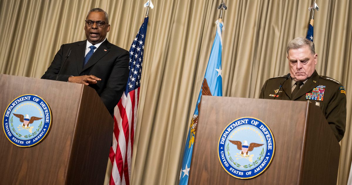 U.S. Secretary of Defense Lloyd Austin and Chairman of the U.S. Joint Chiefs of Staff Gen. Mark Milley speak to the media at Ramstein Air Base on Friday in Ramstein-Miesenbach, Germany.