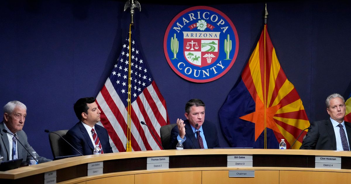 Maricopa County Board of Supervisors, from left, Jack Sellers, Thomas Galvin, Chairman Bill Gates and Clint Hickman are seen in a file photo from Nov. 28 discussing the 2022 general election.