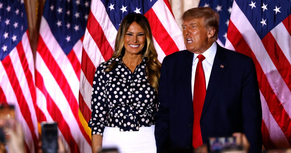 President Donald Trump, joined by former first lady Melania Trump, speaks at the Mar-a-Lago Club in Palm Beach, Florida, on Nov. 15, 2022.