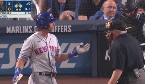 Jeff McNeil of the New York Mets was given a strike on Thursday because his teammate did not get back to first in time after a pitch had been thrown.