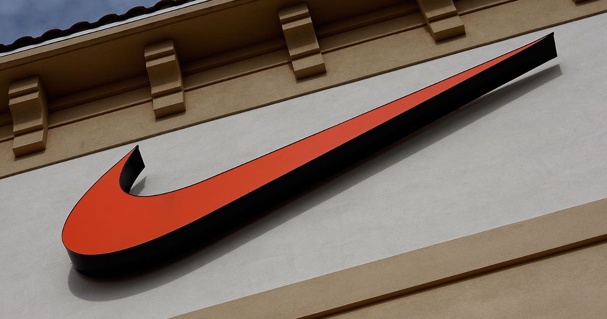 The "Swoosh" logo is seen on a Nike factory store on Dec. 12, 2009, in Orlando, Florida.