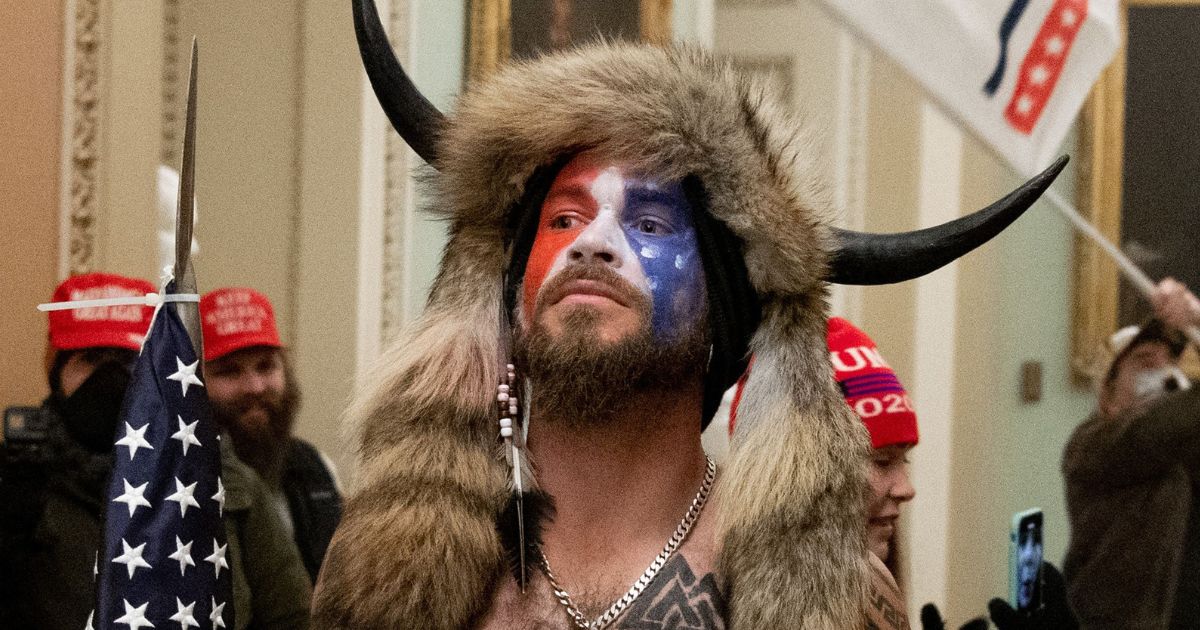 Jacob Anthony Angeli Chansley, known as the QAnon Shaman, is seen in the Capitol on Jan. 6, 2021, in Washington, D.C.