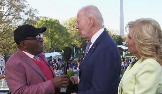 NBC's Al Roker talks to President Joe Biden before the White House Easter egg event while first lady Jill Biden looks on.