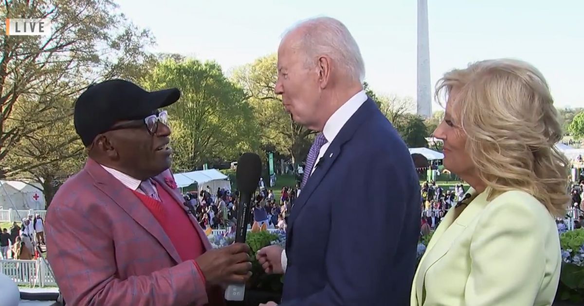 NBC's Al Roker talks to President Joe Biden before the White House Easter egg event while first lady Jill Biden looks on.