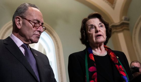 Then-Senate Minority Leader Chuck Schumer and Senate Judiciary Committee ranking member Dianne Feinstein hold a news conference on Capitol Hill in Washington on Oct. 4, 2018.