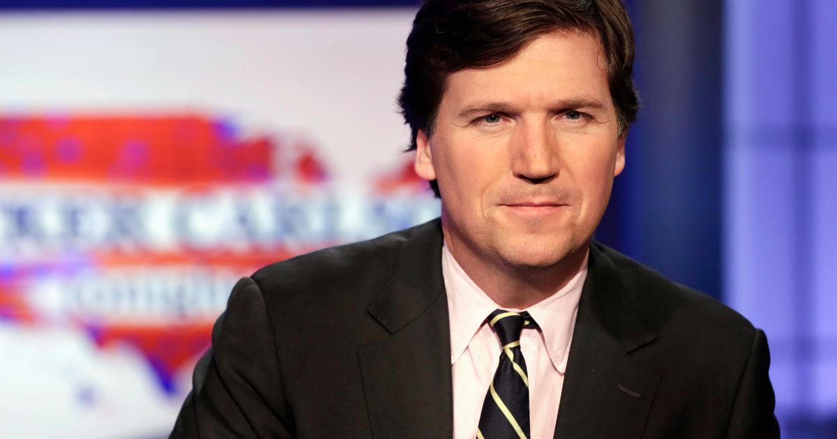 Tucker Carlson poses for photos on March 2, 2017, in New York.