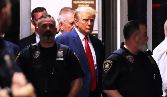 Former President Donald Trump arrives for his arraignment at Manhattan criminal court on Tuesday in New York City.