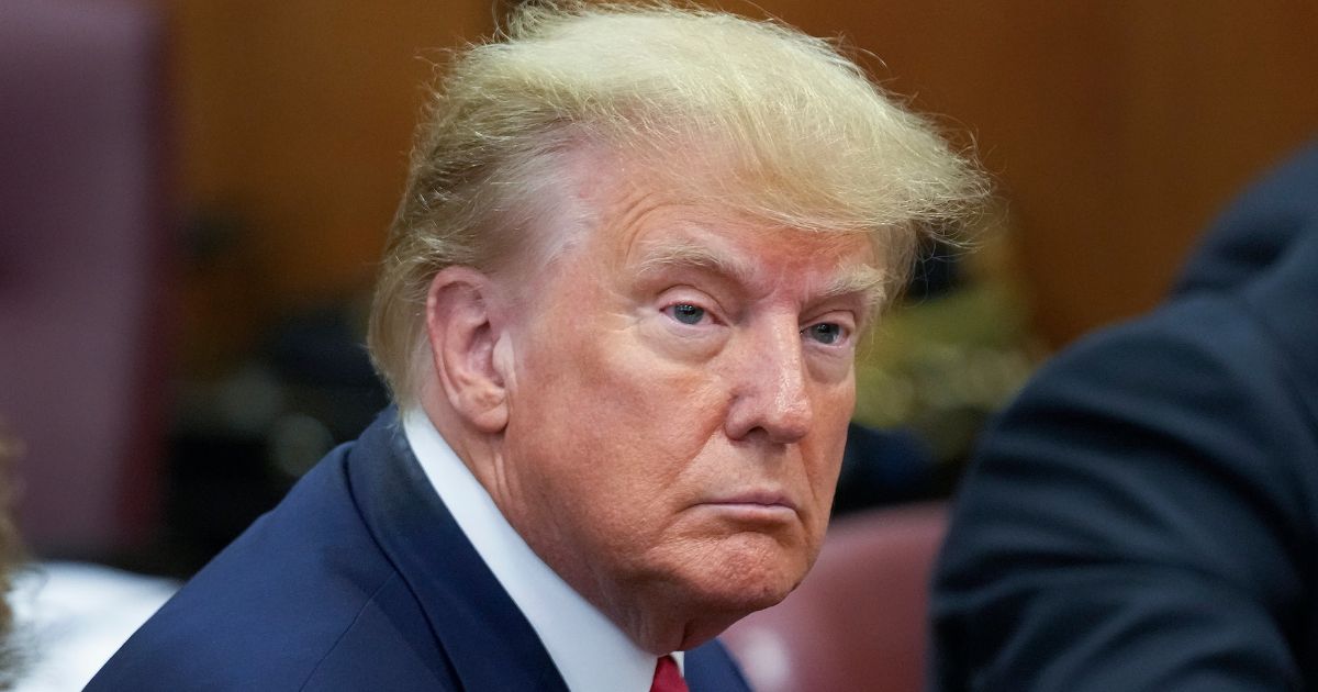 Former President Donald Trump is photographed at the defense table in a Manhattan courtroom on Tuesday.