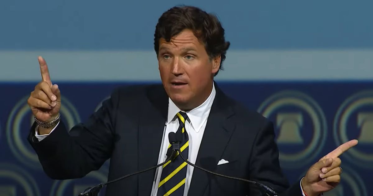 Tucker Carlson speaks at the Heritage Foundation 50th anniversary gala Friday night in National Harbor, Maryland.