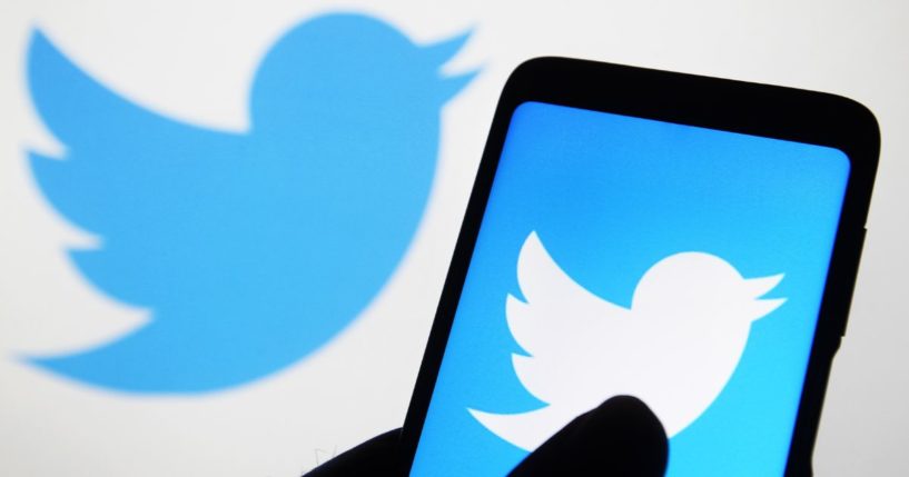 The Twitter logo is seen in the above stock image.