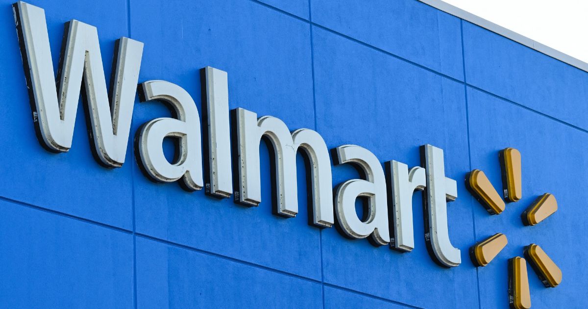 The Walmart logo is seen outside a Walmart store in Burbank, California on Aug. 15, 2022.