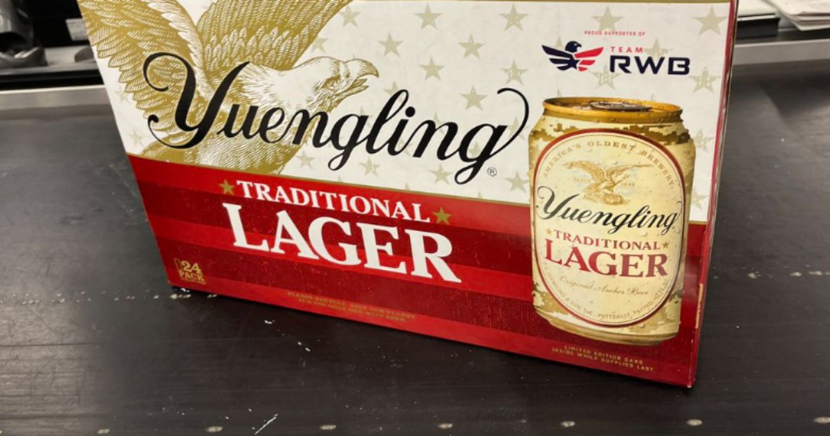 A case of Yuengling beer is pictured in a checkout line.