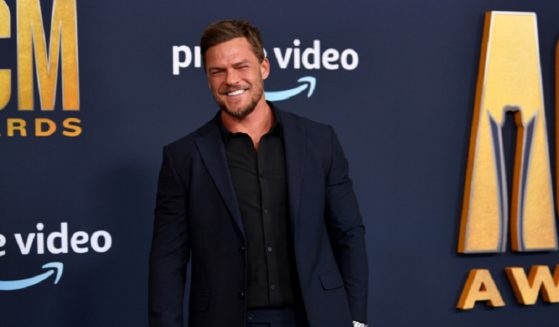 Actor Alan Ritchson, pictured in a March 2022 file photo from the 57th Academy of Country Music Awards at Allegiant Stadium in Las Vegas, Nevada.