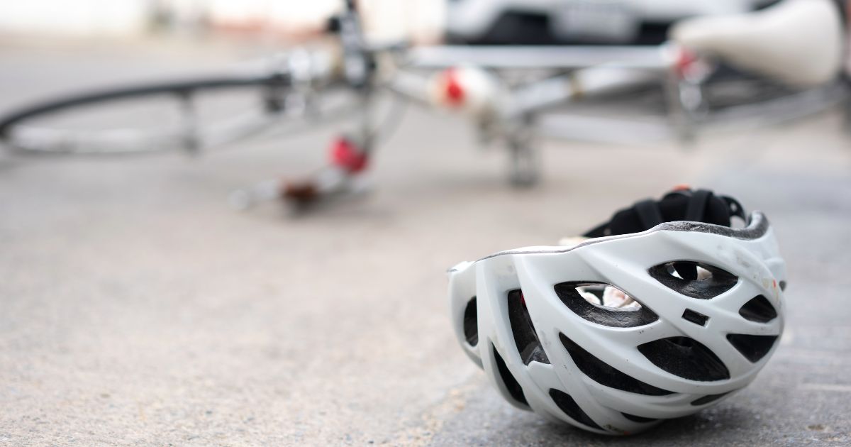 A helmet is seen on the ground in the above stock image.