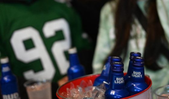 Philadelphia Eagles fans drink Bud Light while watching Super Bowl LVII at City Tap House on February 12, 2023 in Philadelphia.