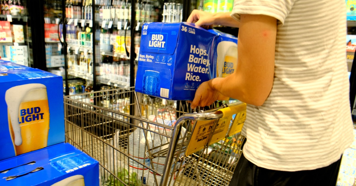 A shopper picks up a 36-can pack of Bud Light in a file photo from 2019.