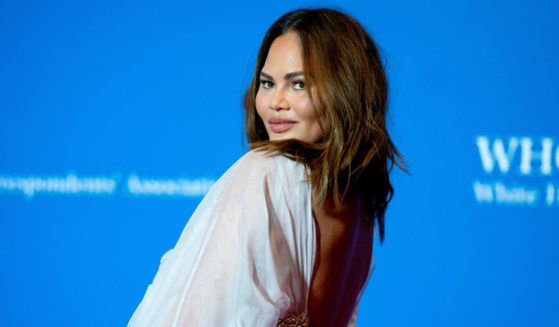 Media personality Chrissy Teigen arrives for the White House Correspondents' Association dinner at the Washington Hilton in Washington, D.C., on Saturday.