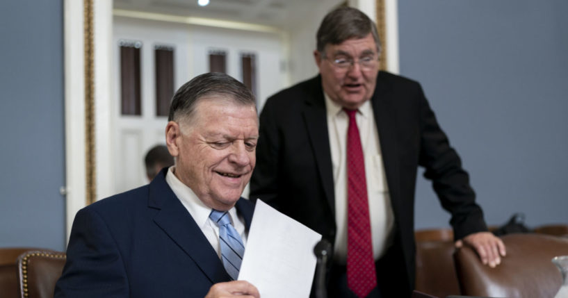 House Rules Committee Chairman Tom Cole speaks with Rep. Michael Burgess