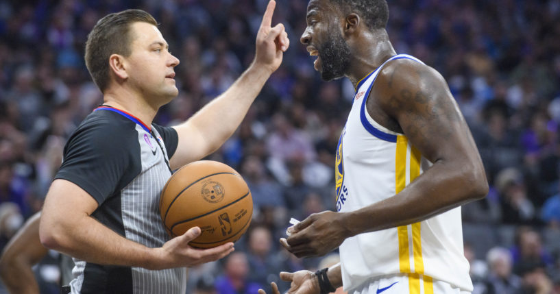 Golden State Warrior forward Draymond Green, right, argues with referee Gediminas Petraitis during the first half of game 2 of the NBA playoffs against the Sacramento Kings in Sacramento, California, on Monday.