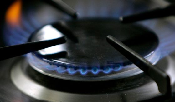 A gas-lit flame burns on a natural gas stove. It's unclear what kind of impact a federal appellate court's ruling overturning a 2019 first-in-the-nation natural gas ban in Berkeley, Calif., will have. A three-judge panel ruled Monday, April 18, 2023, the city of Berkeley violated federal law allowing only the U.S. government to set efficiency standards for appliances. (Thomas Kienzle / Associated Press)