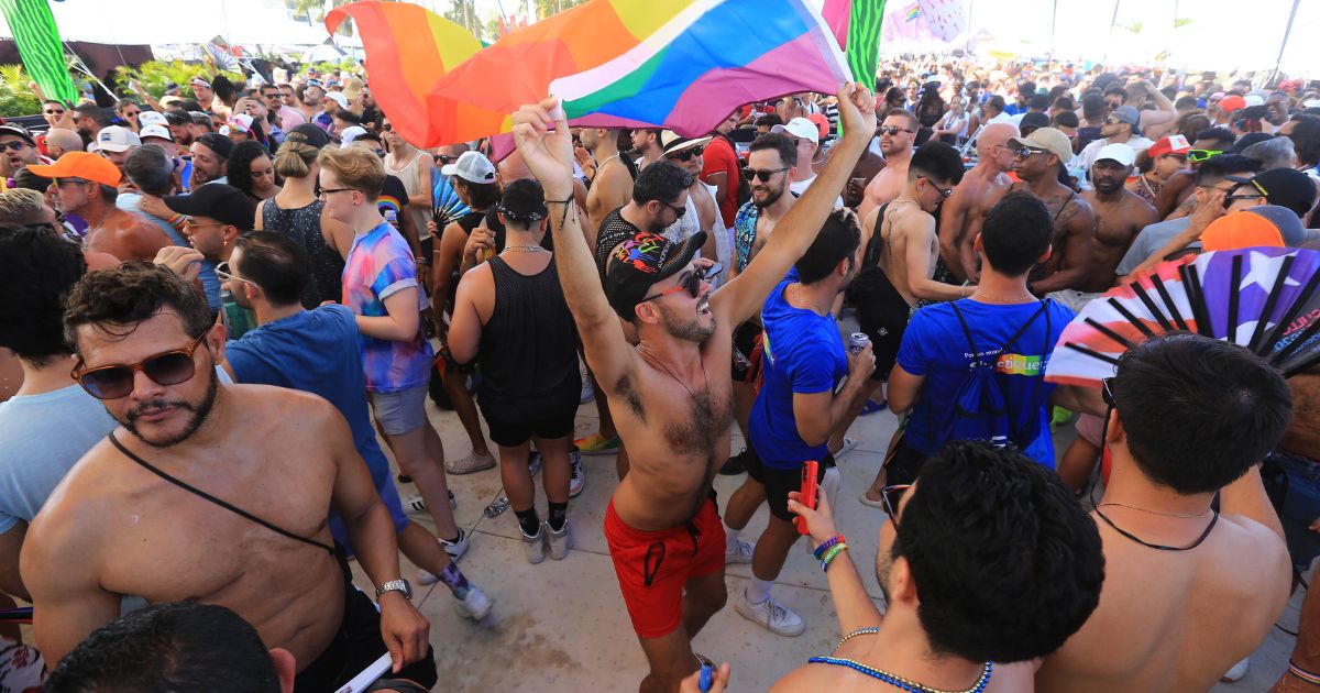 People attend the 15th annual Miami Beach Pride Festival on Sunday in Miami Beach, Florida.