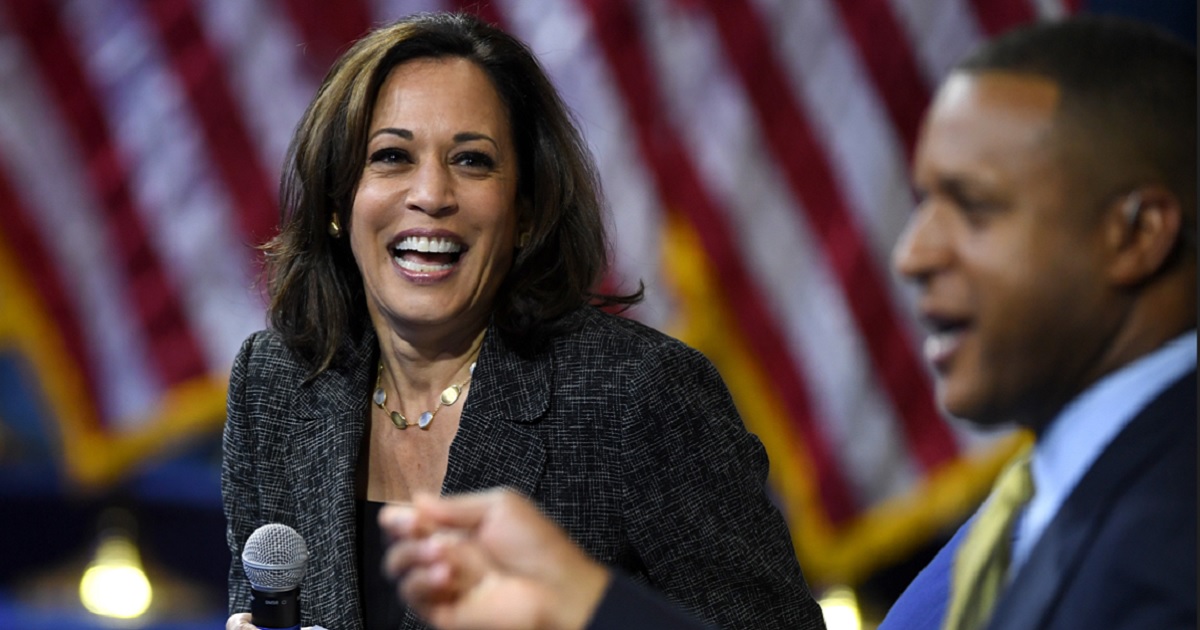 Now-Vice President Kamala Harris laughs in a file photo from October 2019, when she was still a contender for the Democratic presidential nomination.