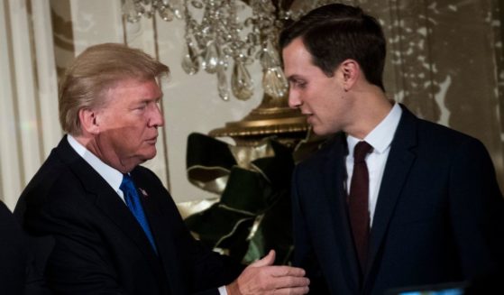 Then President Donald Trump and White House senior advisor to the president Jared Kushner attend a Hanukkah Reception in the East Room of the White House, Dec. 7, 2017, in Washington, D.C.