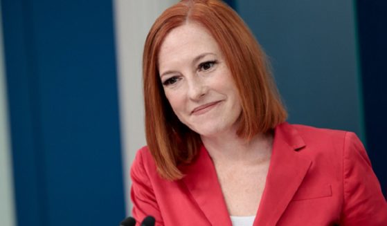 Then-White House press secretary Jen Psaki grins during a news briefing in April 2022. The longtime Democratic operative and communications official in the Obama and Biden administrations, who is now a host for the liberal MSNBC, told an interviewer Monday that she considers herself a "journalist."