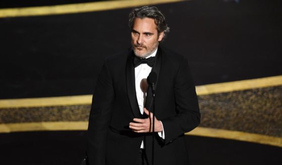 Joaquin Phoenix accepts the Actor In A Leading Role award for "Joker" during the 92nd Annual Academy Awards in Hollywood, California, on Feb. 9, 2020.