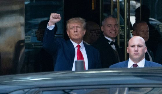 Former President Donald Trump leaves Trump Tower in New York City on Tuesday to go to the Manhattan Criminal Court in New York for arraignment after being indicted by a grand jury last week.
