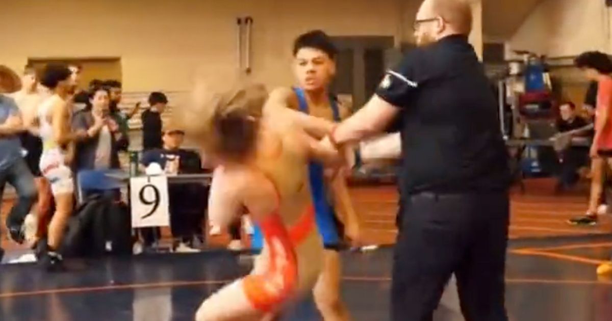 Police in Illinois are investigating after a teenage wrestler sucker-punched his opponent after he lost a match on April 8.