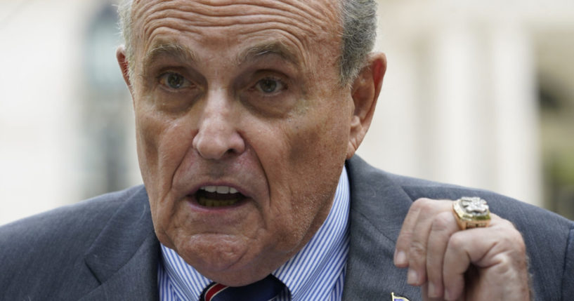 Former New York City Mayor Rudy Giuliani speaking at a news conference