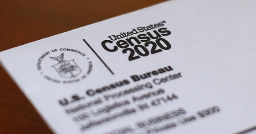 An envelope containing a 2020 census letter mailed to a U.S. resident sits on a desk on on April 5, 2020, in Detroit. The U.S. Census Bureau is contemplating getting rid of a question about a person's ancestry on its most comprehensive survey, saying it may duplicate a newly-revised race question that allows respondents to write in from where they or their antecedents came.