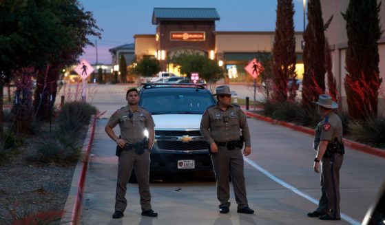 Texas Department of Public Safety officers block an entranceway to the Allen Premium Outlets in Allen, Texas, on Sunday following a mass shooting at the mall on Saturday.