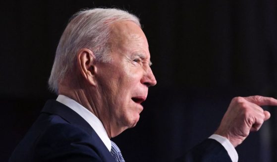 President Joe Biden gestures during a speech at the Washington Hilton in D.C. on April 25.