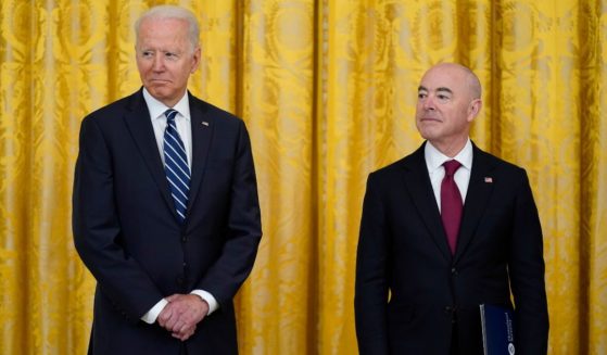 President Joe Biden and Secretary of Homeland Security Alejandro Mayorkas attend a naturalization ceremony in the East Room of the White House in Washington on July 2, 2021.