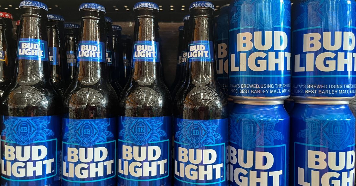 Bottles and cans of Bud Light are displayed on a store shelf in La Fortuna, Costa Rica, on April 12.