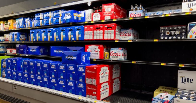 Stacks of Bud Light beer are displayed next to empty shelves for other brands at a grocery store in Atlanta on Friday.