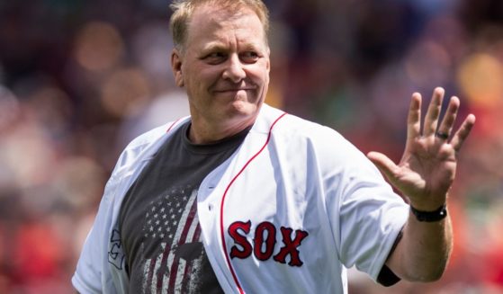 Former Boston Red Sox player Curt Schilling is introduced before a game against the Kansas City Royals on July 30, 2017, at Fenway Park in Boston.