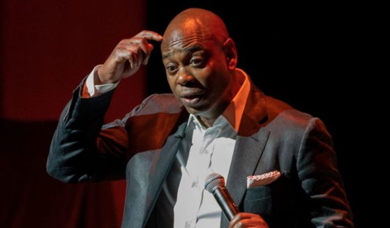 Dave Chappelle performs during a fundraiser for the Duke Ellington School of the Arts in Washington on June 20, 2022.