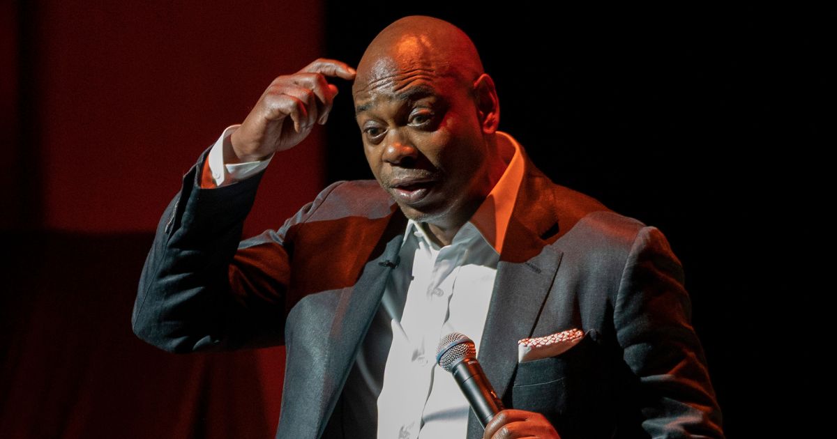 Dave Chappelle performs during a fundraiser for the Duke Ellington School of the Arts in Washington on June 20, 2022.