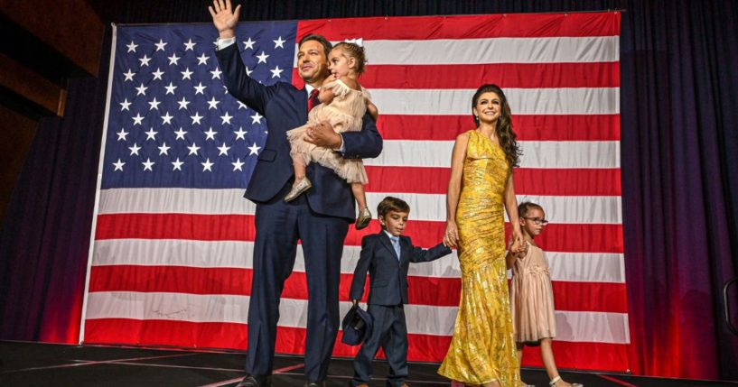 Florida Gov. Ron DeSantis and his family wave to the crowd during an election night watch party in Tampa, Florida, on Nov. 8, 2022.