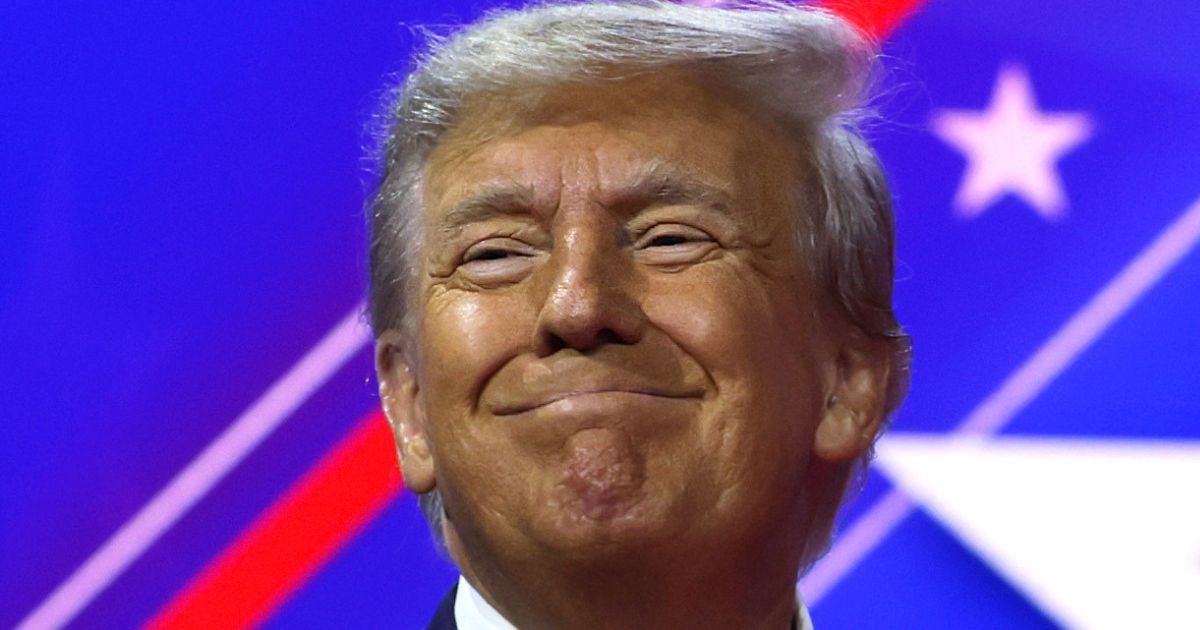 Former President Donald Trump smiles during the Conservative Political Action Conference at the Gaylord National Resort & Convention Center in National Harbor, Maryland, on March 4.