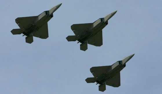 Three F-22 Raptors flow over the track at the NASCAR Nextel Cup Series Coca-Cola 600 in Concord, North Carolina, on May 27, 2007.