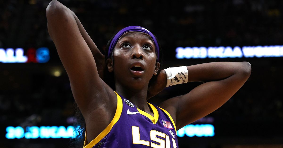 LSU women's basketball player Flau’jae Johnson reacts after defeating the Virginia Tech Hokies during the 2023 NCAA Women's Basketball Tournament Final Four game in Dallas, Texas, on March 31.