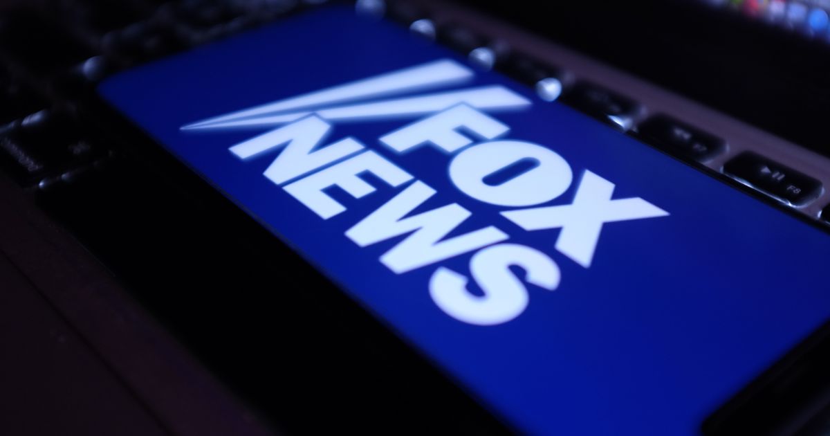 The Fox News logo is displayed on a cellphone in this stock image.