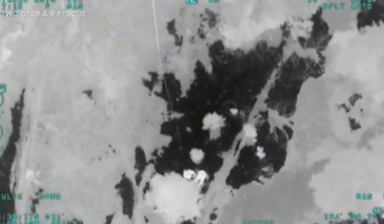 A video shows incredible footage of a missing hiker being rescued in Glacier National Park, Montana, on Monday night. (@DenverChannel / Twitter)