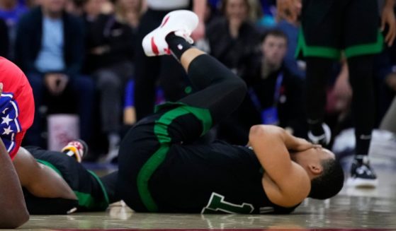 Boston Celtics player Grant Williams reacts after a run-in with Philadelphia 76ers player Joel Embiid during Friday's playoff game in Philadelphia.