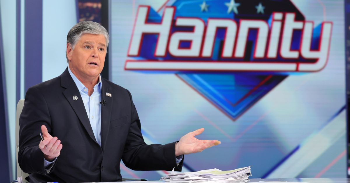 Sean Hannity, seen in a file photo from January, will interview former Vice President Mike Pence Wednesday, the same night former President Donald Trump will appear on a televised CNN Town Hall.