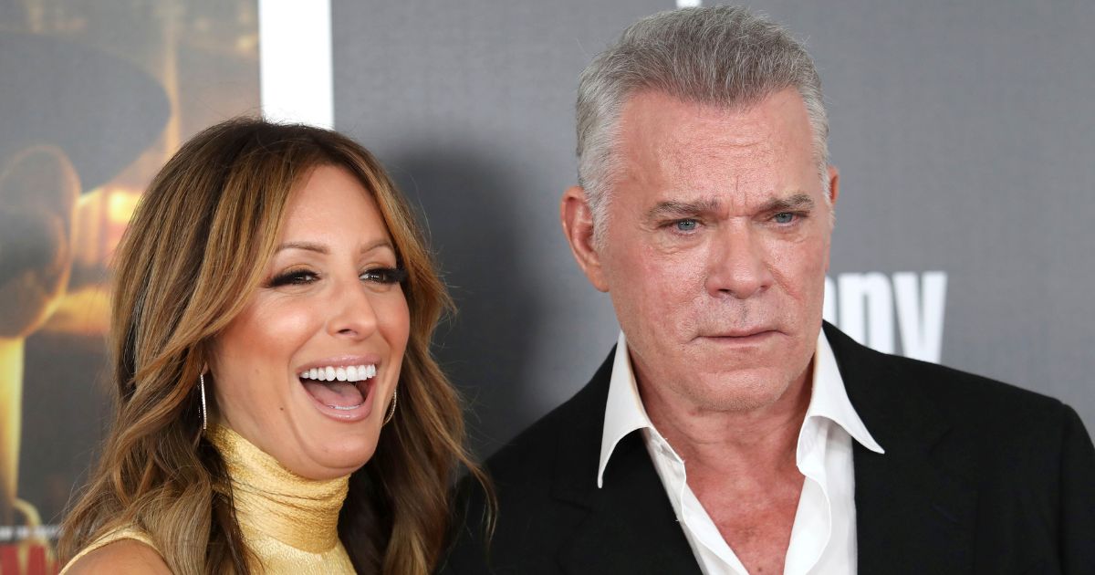 Jacy Nittolo and Ray Liotta attending a premiere together eight months before his death